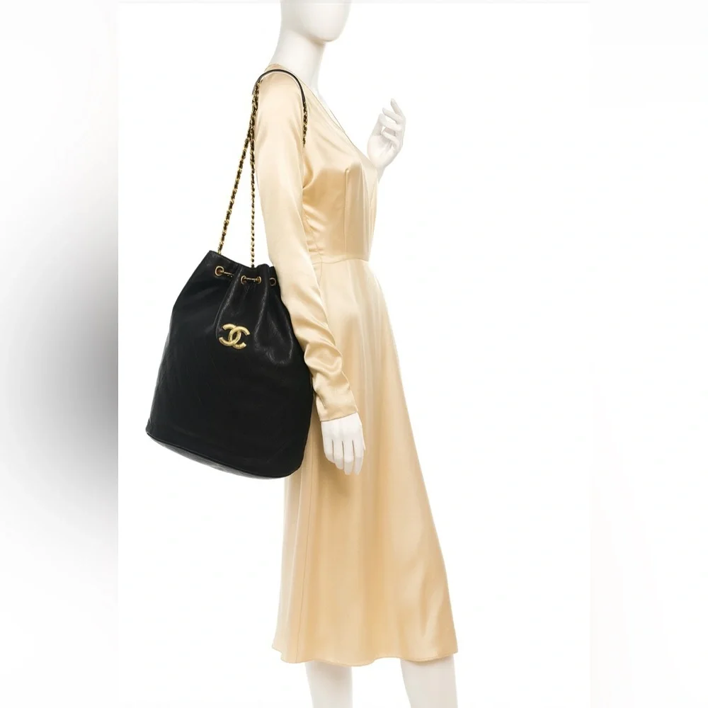 Vintage Chanel Black Lambskin Quilted CC Drawstring Bucket Bag Leather Backpack